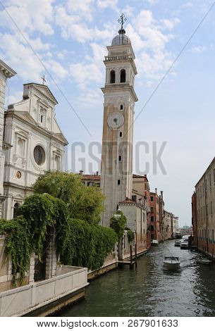 High White Bell Tower Called San Giorgio Dei Greci In Italian Language In The Island Of Venice In It