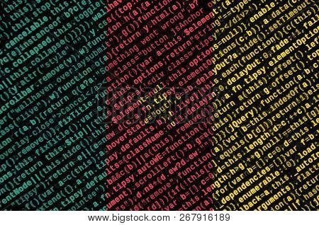 Cameroon Flag  Is Depicted On The Screen With The Program Code. The Concept Of Modern Technology And