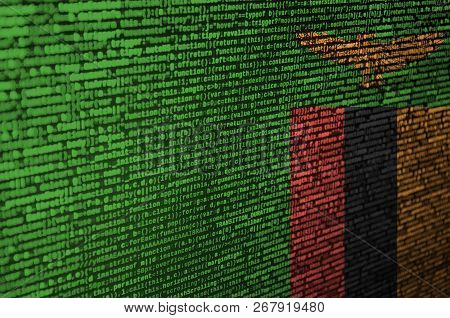 Zambia Flag  Is Depicted On The Screen With The Program Code. The Concept Of Modern Technology And S