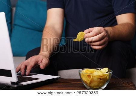 Mindless Snacking, Overeating, Lack Of Physical Activity, Laziness, Homebody. Fat Overweight Man Eng