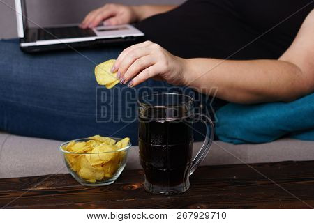 Mindless Snacking, Overeating, Lack Of Physical Activity, Laziness, Homebody. Fat Overweight Woman E