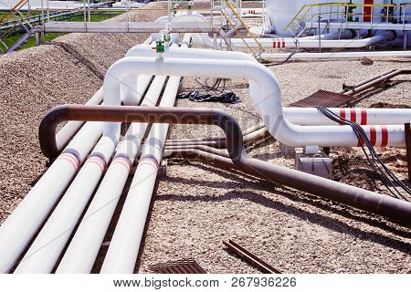 Steel Fuel Pipes And Valves At The Oil Refinery