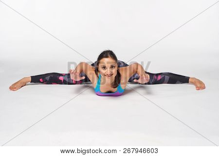 Full Length Woman Practicing Yoga Samakonasana, Splits Pose