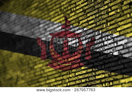 Brunei Darussalam Flag  Is Depicted On The Screen With The Program Code. The Concept Of Modern Techn