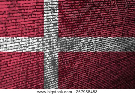 Denmark Flag  Is Depicted On The Screen With The Program Code. The Concept Of Modern Technology And 