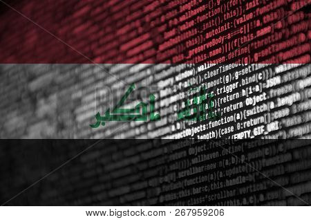 Iraq Flag  Is Depicted On The Screen With The Program Code. The Concept Of Modern Technology And Sit