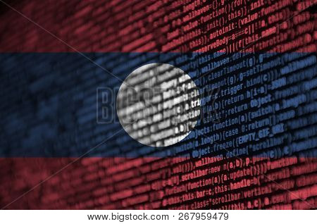 Laos Flag  Is Depicted On The Screen With The Program Code. The Concept Of Modern Technology And Sit