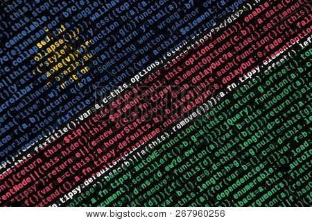 Namibia Flag  Is Depicted On The Screen With The Program Code. The Concept Of Modern Technology And 