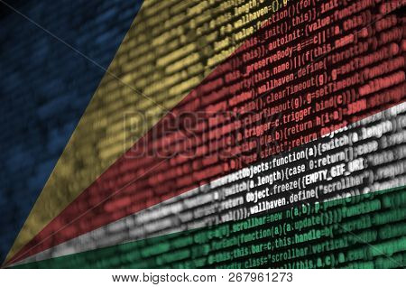 Seychelles Flag  Is Depicted On The Screen With The Program Code. The Concept Of Modern Technology A