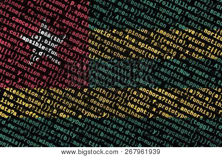 Togo Flag  Is Depicted On The Screen With The Program Code. The Concept Of Modern Technology And Sit