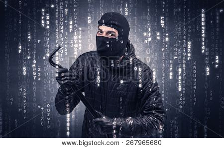 Burglar in action with encoded concept and his tools in his hand. 