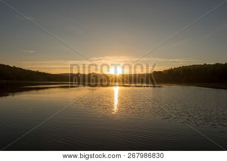 Sunset In The Ruidera Lagoons With The Golden Sky