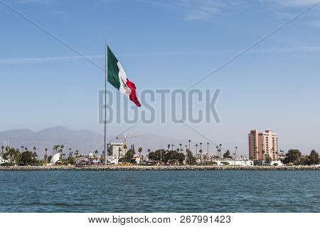 The Skyline Of Ensenada Harbor As Seen From The Ocean In Ensenada, Baja California, Mexico.