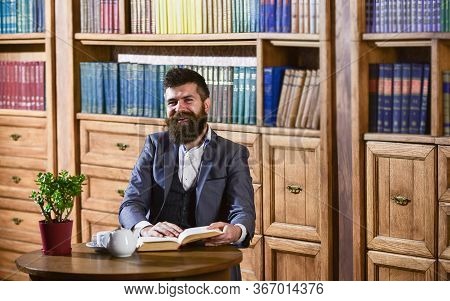 Aristocratic Lifestyle Concept. Aristocrat On Smiling Face Reading Book.