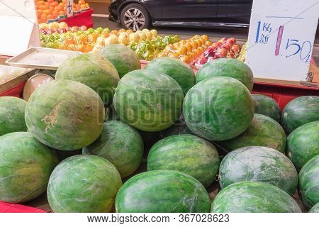 Fresh Harvested Watermelons With Price Tag Label At Fruit Stand In Geylang, Singapore