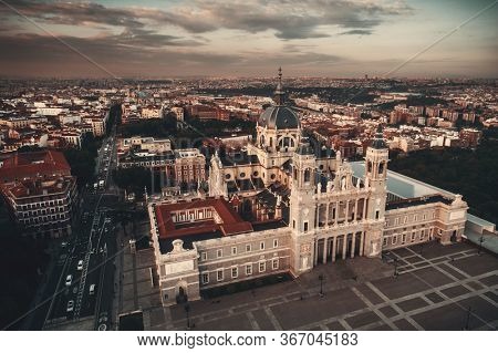 Aerial view of Catedral de la Almudena (Almudena Cathedral) at sunrise in Madrid, Spain.
