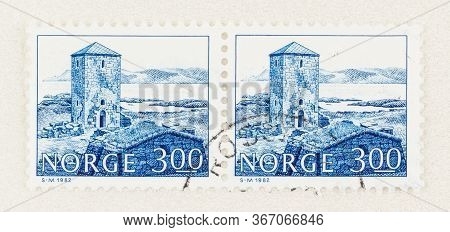 Seattle Washington - May 18, 2020: Ruins Of Selje Monastery In Blue On Used Pair Norway Postage Stam