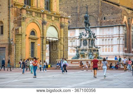 Bologna, Italy - May 9, 2020: Phase 2 Covid-19 Day After. Couples And People With Surgical Mask In P