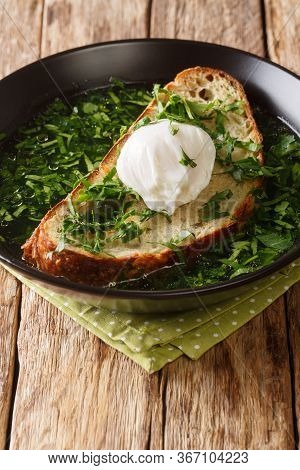 Acorda Soup Of The Alentejo Region Of Portugal. It Is Prepared With Eggs, Bread, Olive Oil, Garlic A