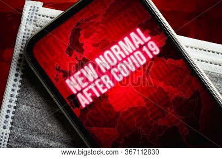 The New Normal After Covid-19 Background Concept. A Smartphone With New Normal After Covid19 Message