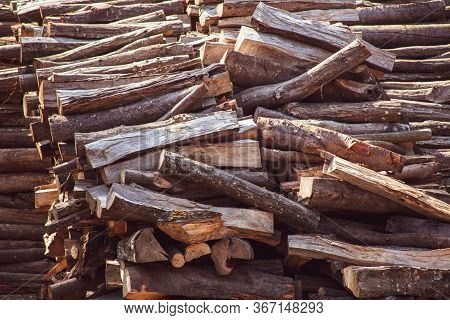 Wooden Natural Cut Logs Laying Horizontal Texture, Background Backdrop Side View, Flat Lay. Lumber, 