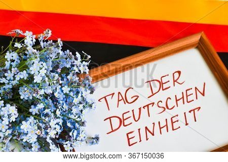 Happy German Unity Day Germany. Classic National Flag Of The Country From Ribbons And The Inscriptio