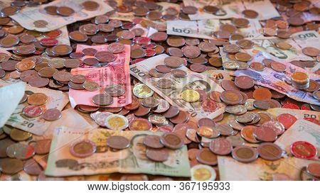 Close Up Of Thai Bath Banknotes, Stack Coins Money In Thailand Thb, Pay Money Donated By People In T