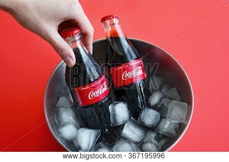 Kharkov, Ukraine - December 01, 2019: Editorial Photo Of 250ml Classic Coca-cola Bottle With Ice On 