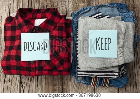 Stack Of Old Clothes To Discard (declutter) Or Keep. Recycle Clothes, Eco Cotton.
