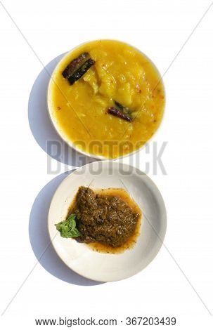Mango Chutney And Pudina Or Mint Leaves Chutney In Plates Isolated On White Background In Vertical O
