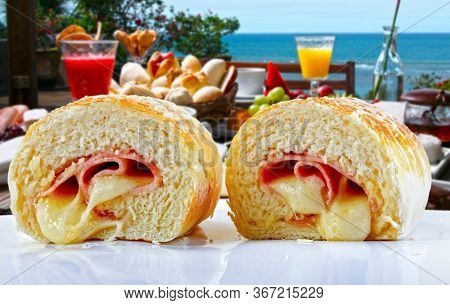 Brazilian snack, wrapped in ham and mozzarella, joelho