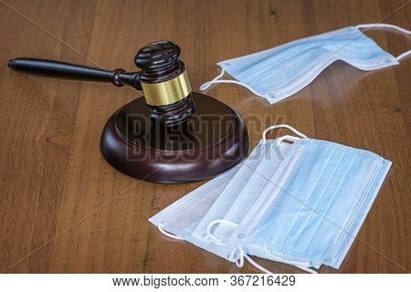 Coronvirus Control Concept. Judgment Of Mandatory Wearing Of Medical Masks.