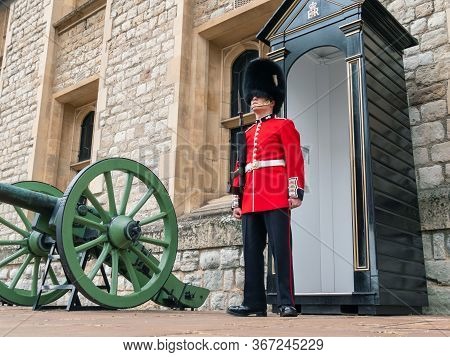 London, Uk - April, 2019: Soldier Of Royal Guard Of London. Soldier Of English Guard Patrols Inside 