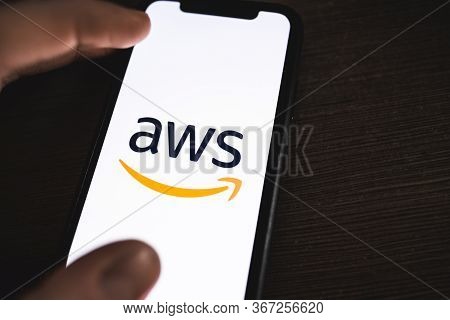 Amazon Web Services Logo On The Smartphone Screen. Copy Space.