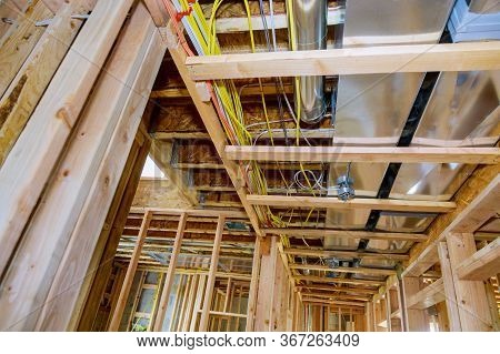 Framed Residential Home With Basic Rough Pipe System Of Heating Completed In New Construction