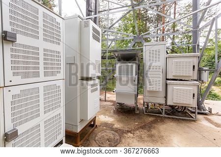 Climatic Vandal-proof Cabinets With Microwave Equipment And Power Cables, Coaxial Cables, Optic Fibe