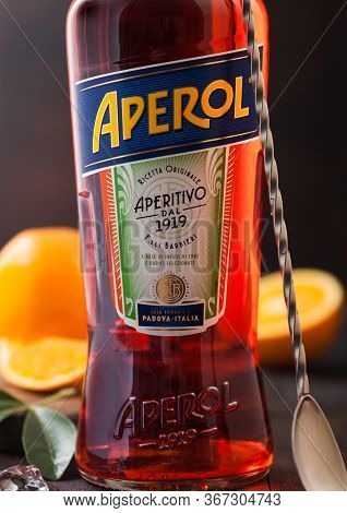 London, Uk - May 20, 2020: Bottle Of Aperol Aperitivo Summer Cocktail Drink With Oranges And Bar Spo