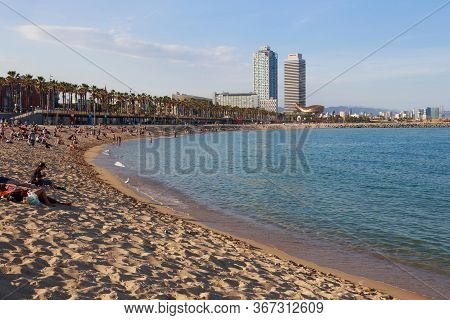 Barcelona, Spain - May 16, 2017: View Of The City Beach In Barcelona On The Mediterranean Sea. With 