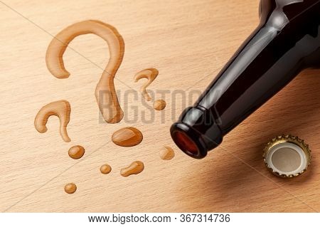 Beer Bottle And Question Marks. Kaka Choose Beer. Why Drink Alcohol