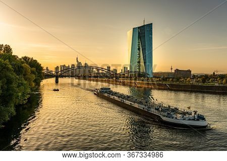 The Frankfurt Skyline At Sunset In The Golden Hour. In The Foreground The R