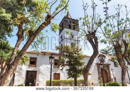 San Marcos Church Sourrounded By Trees On A Sunny Day, Tenerife - Canary Islands