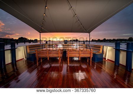 Atmospheric Sunset View During Tourist Cruise From The Aft Ship Deck