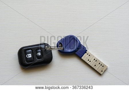 Chipped Door Key With Remote Control.