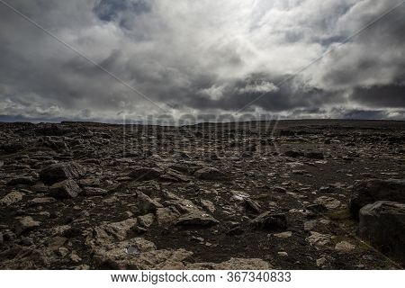 General View Of The Desert Near The Detifoss Waterfall In The North Of Iceland. The Sky Is Cloudy. T