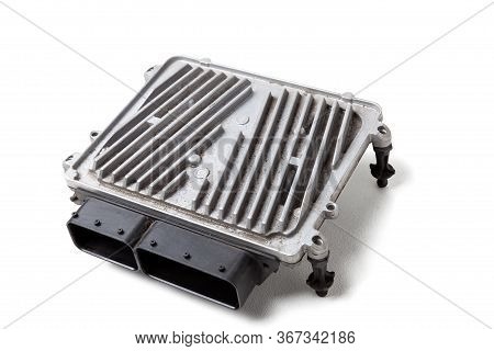A Plastic Car Engine Control Unit With Metal Elements On A White Isolated Background Is The Connecti