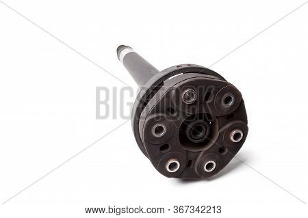 Close-up Of A Black Steel Six-hole Driveshaft On A White Isolated Background In A Used Studio. Spare