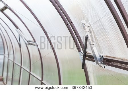Automatic Window Opener In A Greenhouse With A Thermal Drive Serves To Ventilate The Room Without Hu