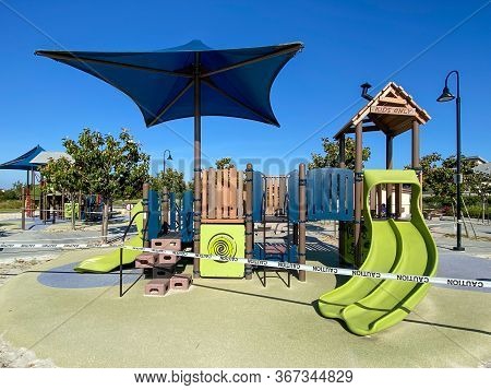 Closed Community Park With Playground For Kids Due To Covid 19. Coronavirus Virus Panic And Quaranti