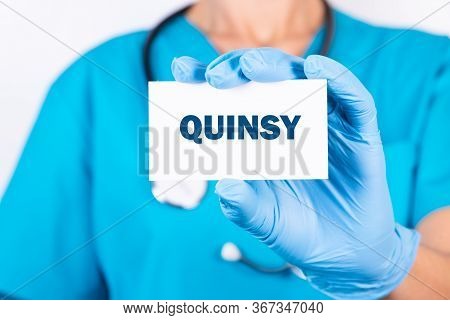 Doctor Holding A Card With Text Quinsy, Medical Concept.