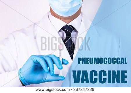 Pneumococcal Vaccine Text Is Written On The Background Of A Doctor Who Is Holding A Syringe With A V